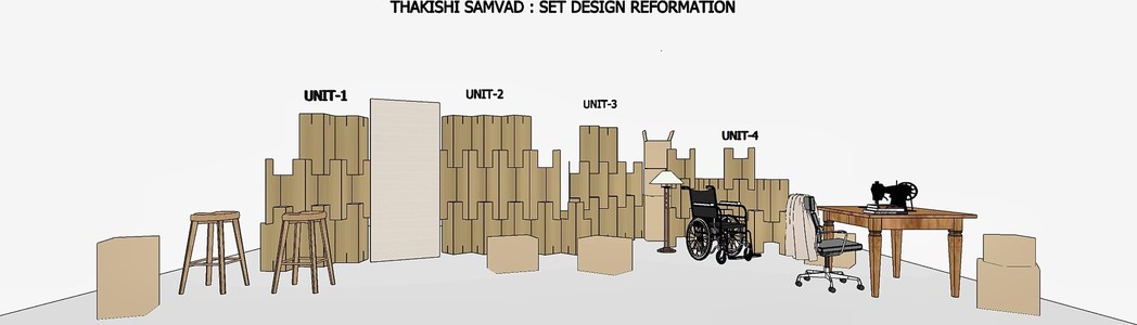 A model elevation of a theatre set — four numbered units built from stacked blocks of different heights, with stools, a table, a chair and a wheelchair placed in front of them.