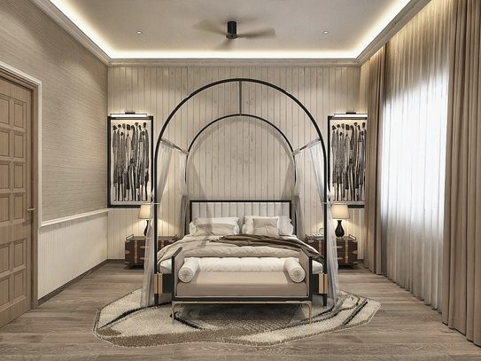 A four-poster bed with a slim black arched canopy frame, between two curtained windows, with a wardrobe run behind it.